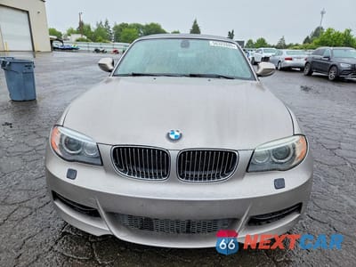 Piąte zdjęcie samochodu w środku: 2012 BMW 135 I VIN:WBAUN7C53CVM26496 - miniatura