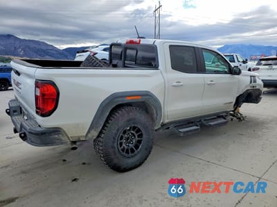 Trzecie zdjęcie samochodu z tyłu: 2024 GMC CANYON AT4X VIN:1GTP6EEK1R1127934 - miniatura
