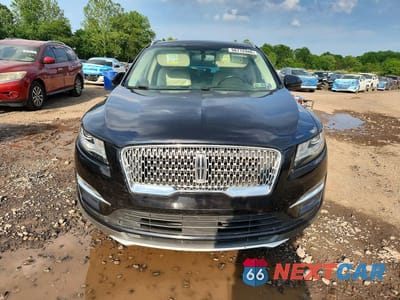 Piąte zdjęcie samochodu w środku: 2019 LINCOLN MKC SELECT VIN:5LMCJ2C93KUL02046 - miniatura