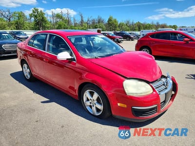 Czwarte zdjęcie samochodu z boku: 2009 VOLKSWAGEN JETTA VIN:3VWRZ71K79M036720 - miniatura