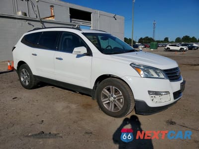 Czwarte zdjęcie samochodu z boku: 2016 CHEVROLET TRAVERSE LT VIN:1GNKVHKDXGJ303033 - miniatura