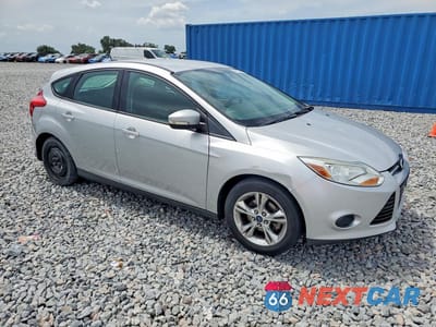 Czwarte zdjęcie samochodu z boku: 2014 FORD FOCUS SE VIN:1FADP3K28EL315721 - miniatura