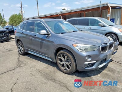 Czwarte zdjęcie samochodu z boku: 2018 BMW X1 XDRIVE28I VIN:WBXHT3Z39J4A66393 - miniatura