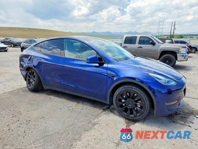 Czwarte zdjęcie samochodu z boku: 2020 TESLA MODEL Y VIN:5YJYGDEEXLF033944 - miniatura