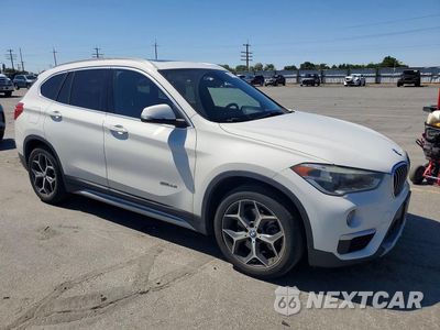 Czwarte zdjęcie samochodu z boku: 2016 BMW X1 XDRIVE28I VIN:WBXHT3C35GP880778 - miniatura
