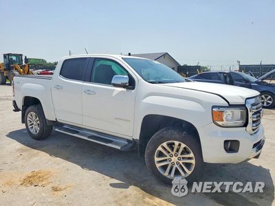 Czwarte zdjęcie samochodu z boku: 2017 GMC CANYON SLT VIN:1GTG6DEN5H1156078 - miniatura