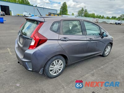 Trzecie zdjęcie samochodu z tyłu: 2016 HONDA FIT LX VIN:JHMGK5H53GS003283 - miniatura