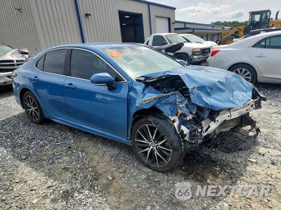 Czwarte zdjęcie samochodu z boku: 2024 TOYOTA CAMRY SE VIN:4T1G11AK0RU190563 - miniatura