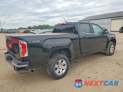 Trzecie zdjęcie samochodu z tyłu: 2018 GMC CANYON SLE VIN:1GTG6CEN5J1100786 - miniatura