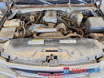 Zdjęcie 11 z 13 samochodu: 1999 GMC NEW SIERRA K1500 VIN:1GTEK19T3XE534688 - miniatura