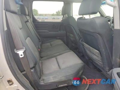 Zdjęcie 10 z 13 samochodu: 2006 HONDA RIDGELINE RTS VIN:2HJYK16416H571994 - miniatura
