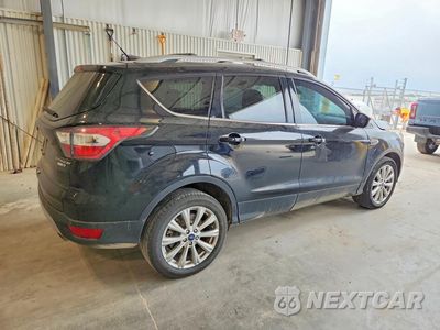 Trzecie zdjęcie samochodu z tyłu: 2017 FORD ESCAPE TITANIUM VIN:1FMCU9JD6HUA84509 - miniatura