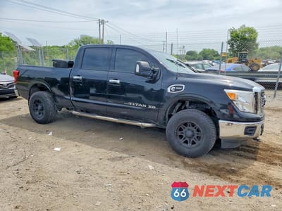 Czwarte zdjęcie samochodu z boku: 2017 NISSAN TITAN XD SV VIN:1N6BA1F31HN552549 - miniatura