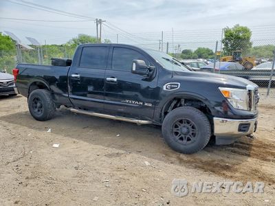 Czwarte zdjęcie samochodu z boku: 2017 NISSAN TITAN XD SV VIN:1N6BA1F31HN552549 - miniatura