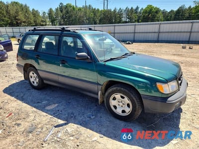 Czwarte zdjęcie samochodu z boku: 1998 SUBARU FORESTER L VIN:JF1SF635XWH783054 - miniatura