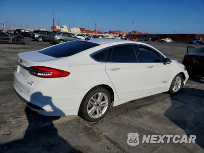 Trzecie zdjęcie samochodu z tyłu: 2018 FORD FUSION SE HYBRID VIN:3FA6P0LU6JR172111 - miniatura