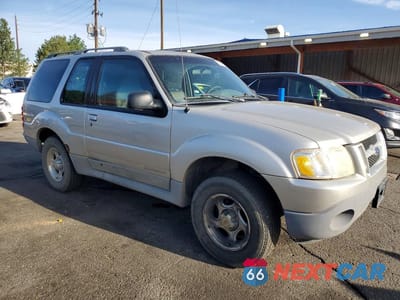 Czwarte zdjęcie samochodu z boku: 2002 FORD EXPLORER SPORT VIN:1FMYU60E72UC50400 - miniatura