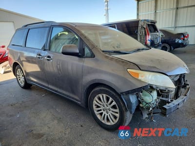 Czwarte zdjęcie samochodu z boku: 2011 TOYOTA SIENNA XLE 8-PASSENGER VIN:5TDYK3DC1BS174114 - miniatura