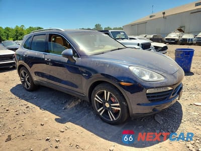 Czwarte zdjęcie samochodu z boku: 2012 PORSCHE CAYENNE S HYBRID VIN:WP1AE2A25CLA90975 - miniatura
