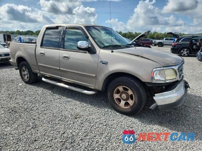 Czwarte zdjęcie samochodu z boku: 2002 FORD F150 SUPERCREW VIN:1FTRW07612KB60220 - miniatura