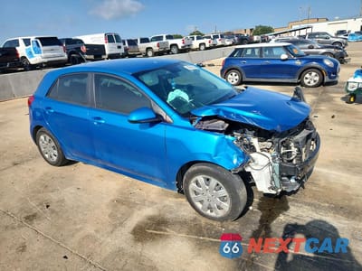 Czwarte zdjęcie samochodu z boku: 2022 KIA RIO S VIN:3KPA25AD8NE506459 - miniatura