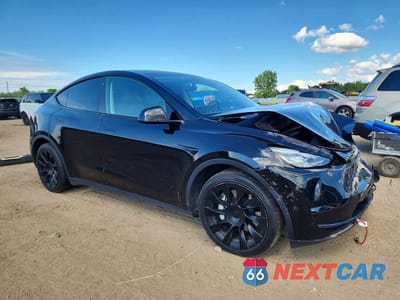 Czwarte zdjęcie samochodu z boku: 2023 TESLA MODEL Y VIN:7SAYGDEE3PA026064 - miniatura