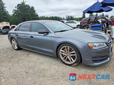 Czwarte zdjęcie samochodu z boku: 2017 AUDI A8 L QUATTRO VIN:WAU44AFD5HN006975 - miniatura