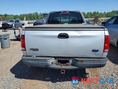 Zdjęcie 6 z 12 samochodu: 2002 FORD F-150 VIN:1FTRX17242NB29395 - miniatura