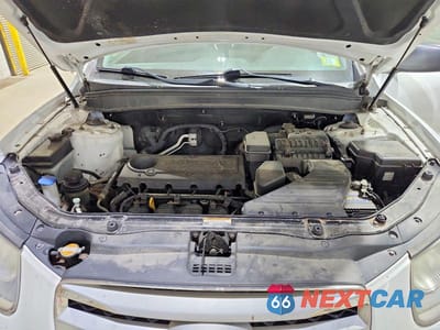 Zdjęcie 12 z 13 samochodu: 2012 HYUNDAI SANTA FE VIN:5XYZGDAB0CG119479 - miniatura