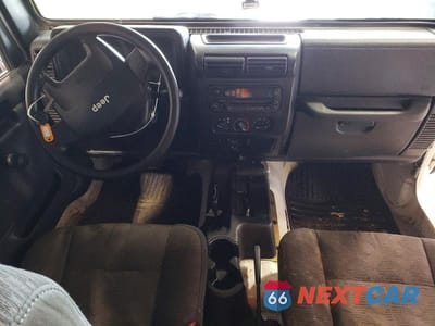 Zdjęcie 8 z 12 samochodu: 2004 JEEP WRANGLER VIN:1J4FA29104P787120 - miniatura