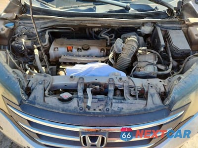 Zdjęcie 12 z 13 samochodu: 2014 HONDA CR-V LX VIN:3CZRM3H39EG710121 - miniatura