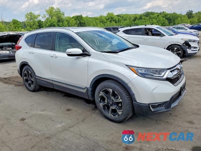 Czwarte zdjęcie samochodu z boku: 2019 HONDA CR-V TOURING VIN:2HKRW2H91KH648151 - miniatura