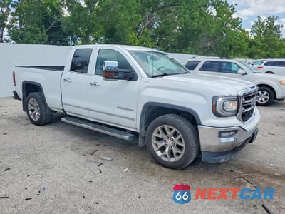 Czwarte zdjęcie samochodu z boku: 2017 GMC SIERRA SLT VIN:1GTV2NEJ2HZ287587 - miniatura