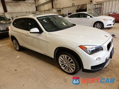 Czwarte zdjęcie samochodu z boku: 2013 BMW X1 XDRIVE28I VIN:WBAVL1C53DVR86415 - miniatura