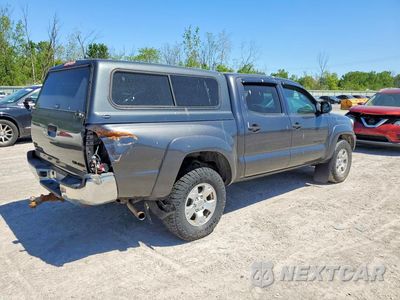 Trzecie zdjęcie samochodu z tyłu: 2014 TOYOTA TACOMA DOUBLE CAB VIN:3TMLU4EN7EM148549 - miniatura