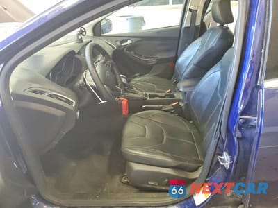 Zdjęcie 7 z 12 samochodu: 2016 FORD FOCUS TITANIUM VIN:1FADP3J26GL335759 - miniatura