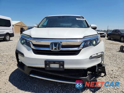 Piąte zdjęcie samochodu w środku: 2021 HONDA PILOT EXL VIN:5FNYF6H58MB050754 - miniatura