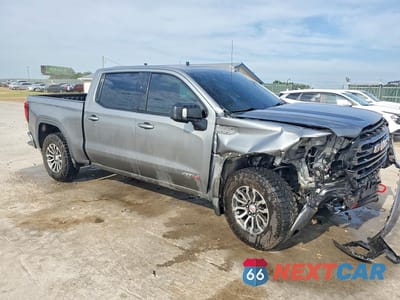 Czwarte zdjęcie samochodu z boku: 2021 GMC SIERRA K1500 AT4 VIN:3GTP9EEL1MG186072 - miniatura