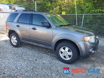 Czwarte zdjęcie samochodu z boku: 2011 FORD ESCAPE XLT VIN:1FMCU0D70BKA73297 - miniatura