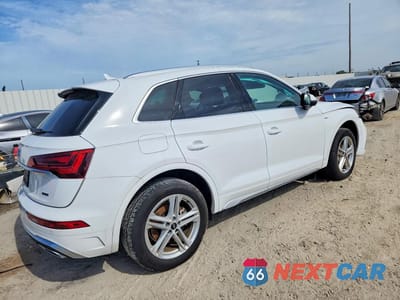 Trzecie zdjęcie samochodu z tyłu: 2025 AUDI Q5 E PREMIUM 55 VIN:WA1G2BFY5S2060004 - miniatura