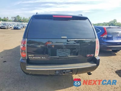 Zdjęcie 6 z 13 samochodu: 2012 GMC YUKON XL DENALI VIN:1GKS2MEF4CR270070 - miniatura