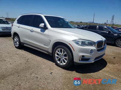 Czwarte zdjęcie samochodu z boku: 2014 BMW X5 SDRIVE35I VIN:5UXKR2C55E0C00396 - miniatura
