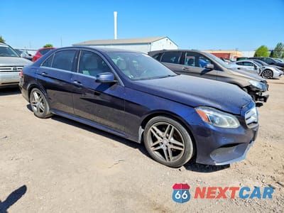 Czwarte zdjęcie samochodu z boku: 2016 MERCEDES-BENZ E 400 4MATIC VIN:WDDHF6HB8GB298635 - miniatura