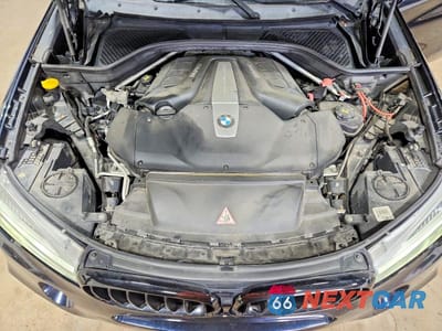 Zdjęcie 12 z 13 samochodu: 2014 BMW X5 XDRIVE50I VIN:5UXKR6C5XE0J73622 - miniatura