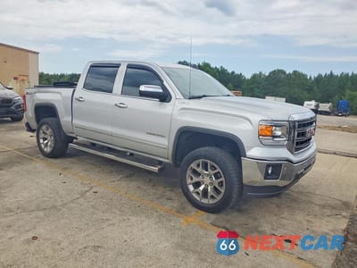 Czwarte zdjęcie samochodu z boku: 2015 GMC SIERRA K1500 SLT VIN:3GTU2VEC9FG438631 - miniatura