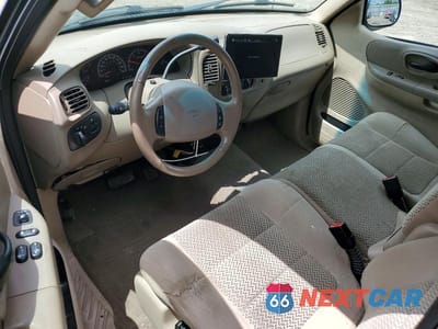 Zdjęcie 8 z 12 samochodu: 2002 FORD F150 VIN:1FTRX17W92NB58989 - miniatura
