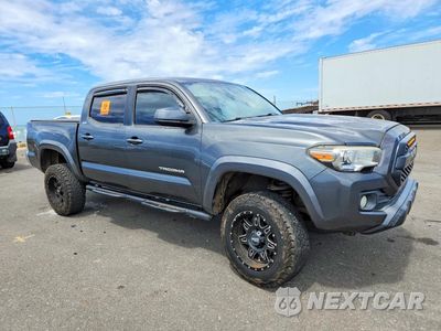 Czwarte zdjęcie samochodu z boku: 2016 TOYOTA TACOMA SR5 V6 VIN:3TMAZ5CN7GM015617 - miniatura