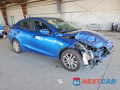 Czwarte zdjęcie samochodu z boku: 2017 TOYOTA YARIS IA BASE VIN:3MYDLBYV7HY147715 - miniatura