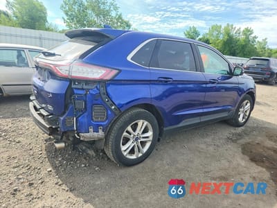Trzecie zdjęcie samochodu z tyłu: 2015 FORD EDGE SEL VIN:2FMTK4J93FBC18254 - miniatura