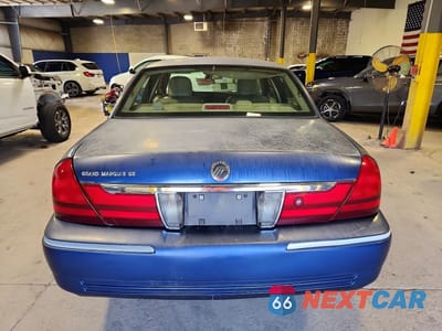 Zdjęcie 6 z 12 samochodu: 2004 MERCURY GRAND MARQUIS GS VIN:2MEFM74W04X605101 - miniatura